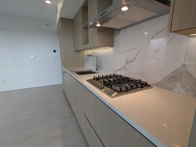 2202 9887 WHALLEY BOULEVARD - photo 1 of 18