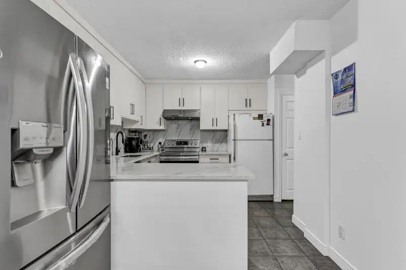 13293 71B AVENUE - photo 3 of 26