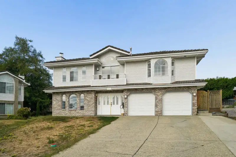 7021 143A STREET - photo 1 of 24