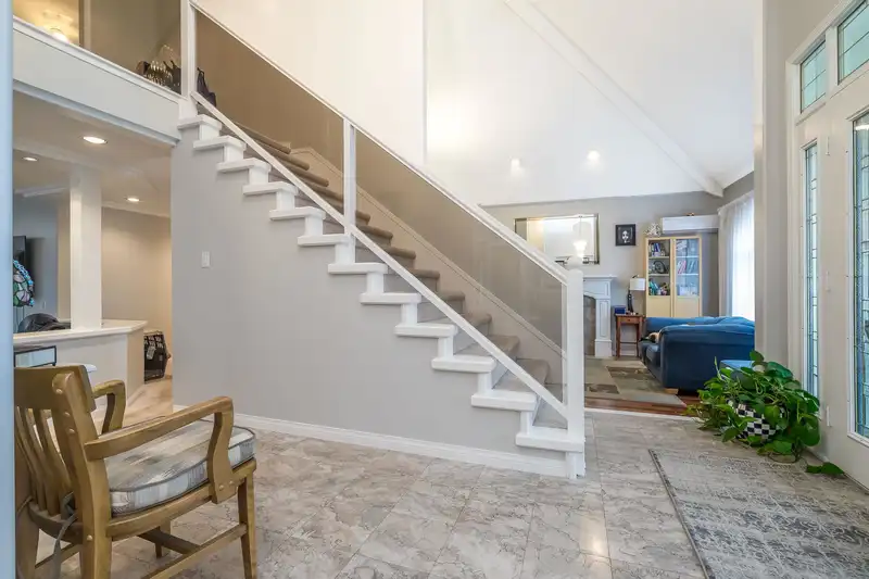 5715 144A STREET - photo 3 of 40
