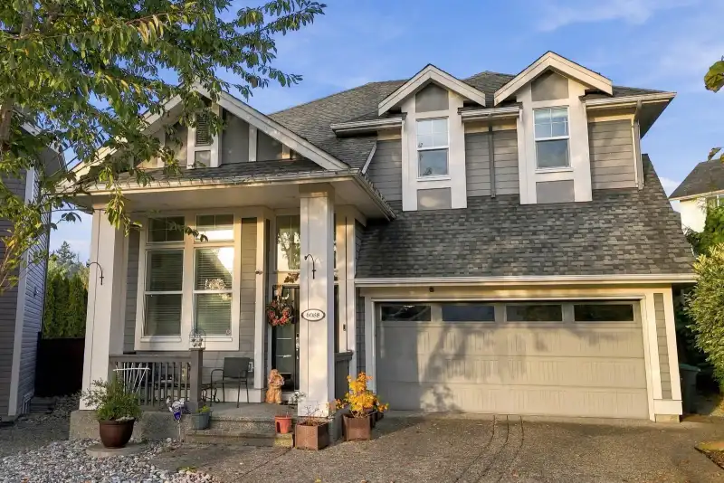 6088 163A STREET - photo 1 of 25