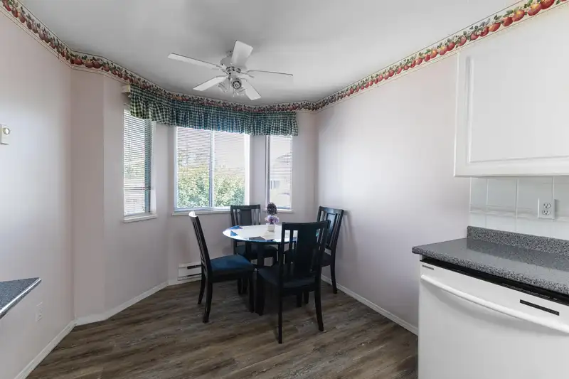 203 9310 KING GEORGE BOULEVARD - photo 2 of 26