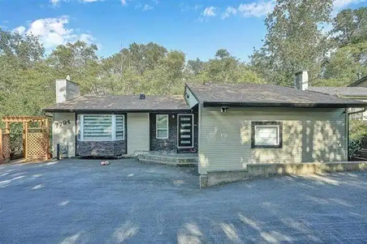 7794 141B STREET - photo 2 of 40