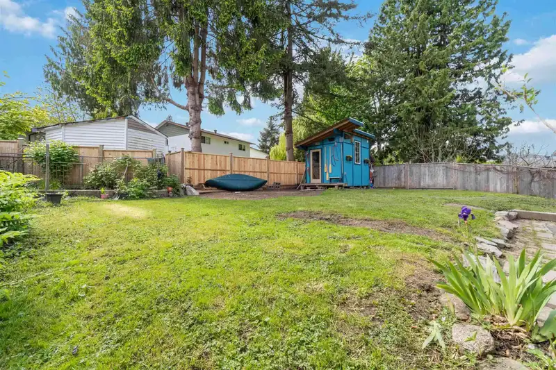 7595 143 STREET - photo 3 of 9