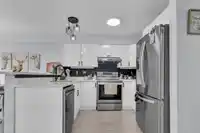 202 9580 PRINCE CHARLES BOULEVARD - thumbnail 13