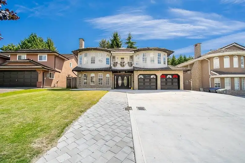 14298 90 AVENUE - photo 1 of 9